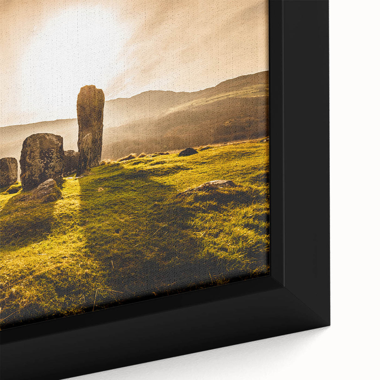 Black wall art featuring a textured depiction of an Irish landscape in vibrant colors on a framed canvas.