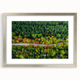 Extra large abstract art print of a textured European landscape in muted earth tones, framed in silver.