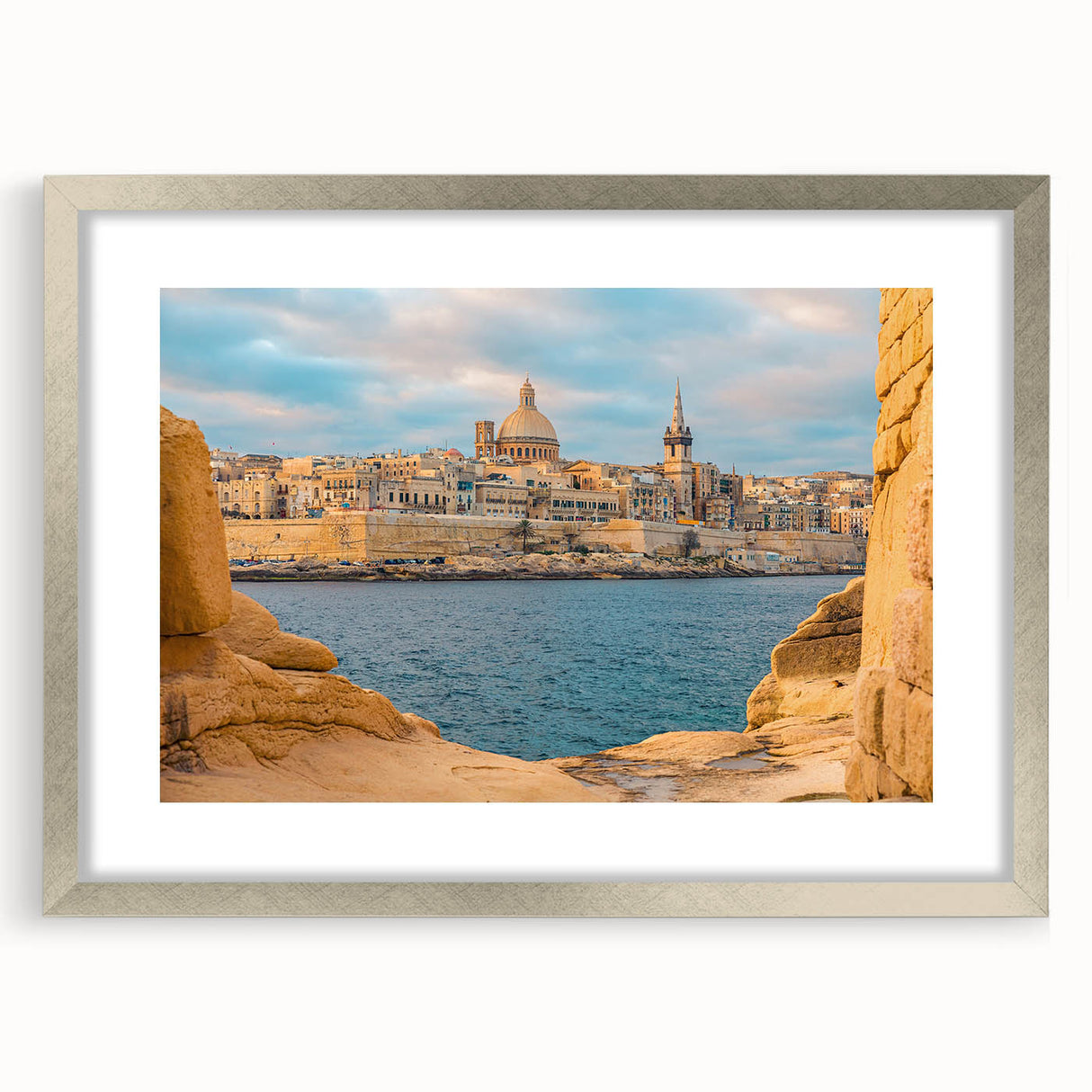 Extra large abstract art print featuring textured scenery of Malta in muted earth tones, framed in silver.