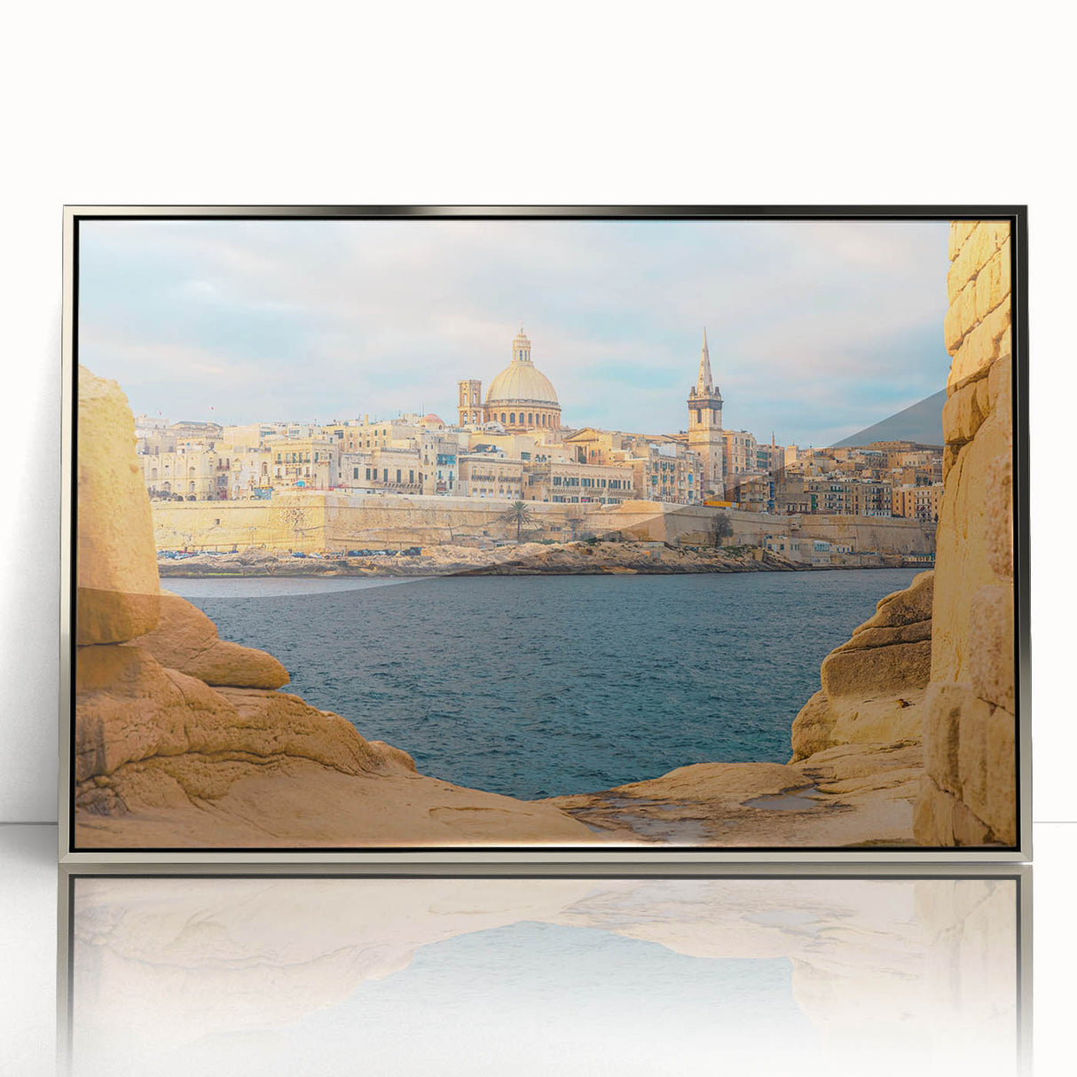 Large art print of a European Malta scenery in muted earth tones on a silver-framed acrylic.