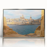 Large art print of a European Malta scenery in muted earth tones on a silver-framed acrylic.