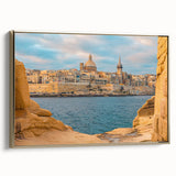 Framed canvas featuring a vintage-style landscape painting of Malta with dominant black and gold tones.