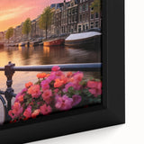 Black wall art depicting a textured Amsterdam canal scene with colorful buildings on framed canvas, ideal for a living room.