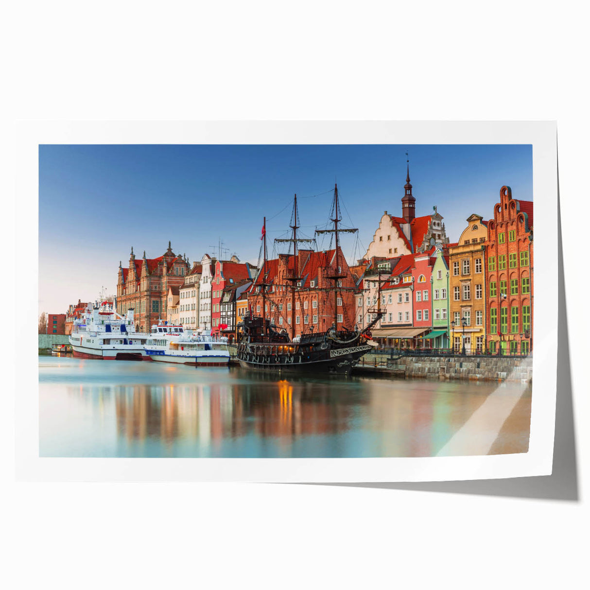 Rolled print of a European landscape featuring a Polish scenery in muted green and blue tones.