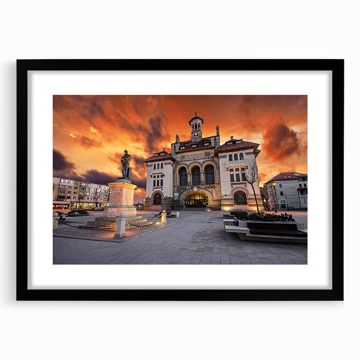 Extra large abstract art print of a colorful, textured European scenery on a black framed canvas.
