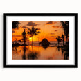 Abstract art print of Cancun scenery in vibrant colors, textured on a large black-framed canvas.