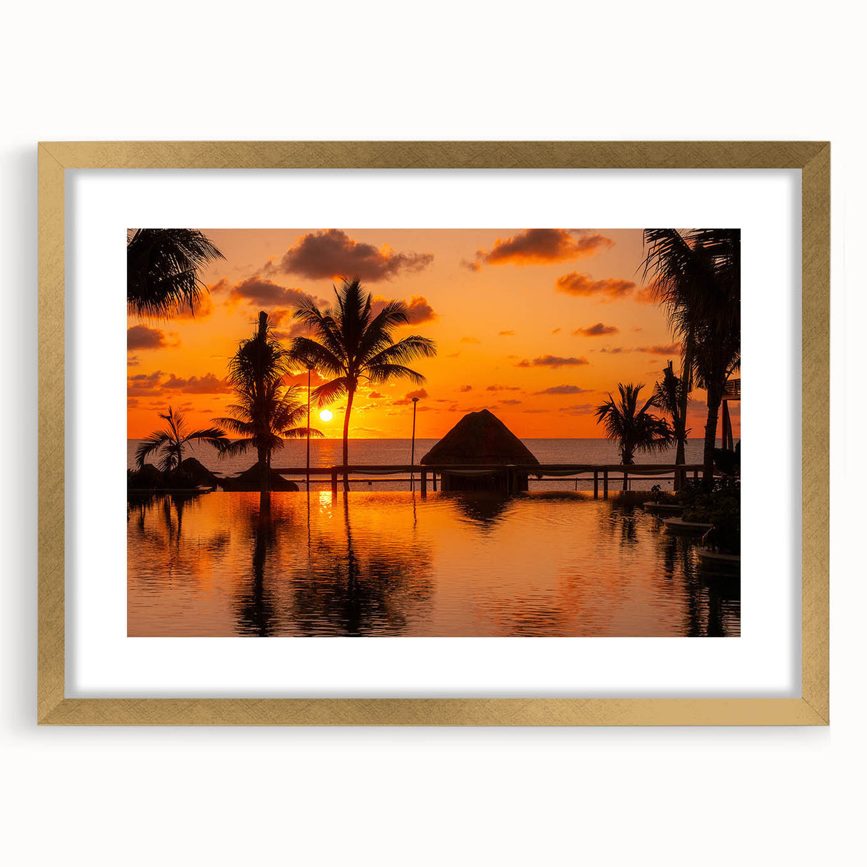 Extra large framed abstract art print of Cancun scenery in textured gold frame, ideal for living room decor.