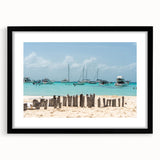Colorful abstract art print of a vibrant Mexican scenery in a black frame, ideal for living room decor.