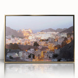 Large art print featuring a mid-century modernist scene of Oman in gold and earth tones on a framed acrylic.