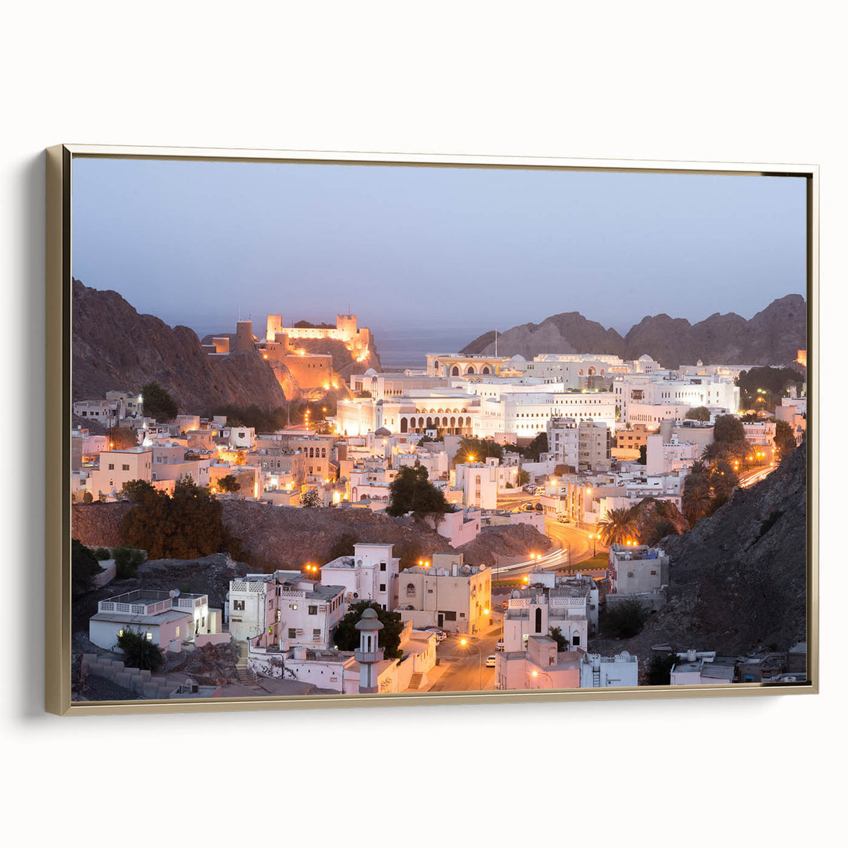 Framed canvas featuring a vintage-style landscape painting of the Middle Eastern scenery in muted gold and black tones.