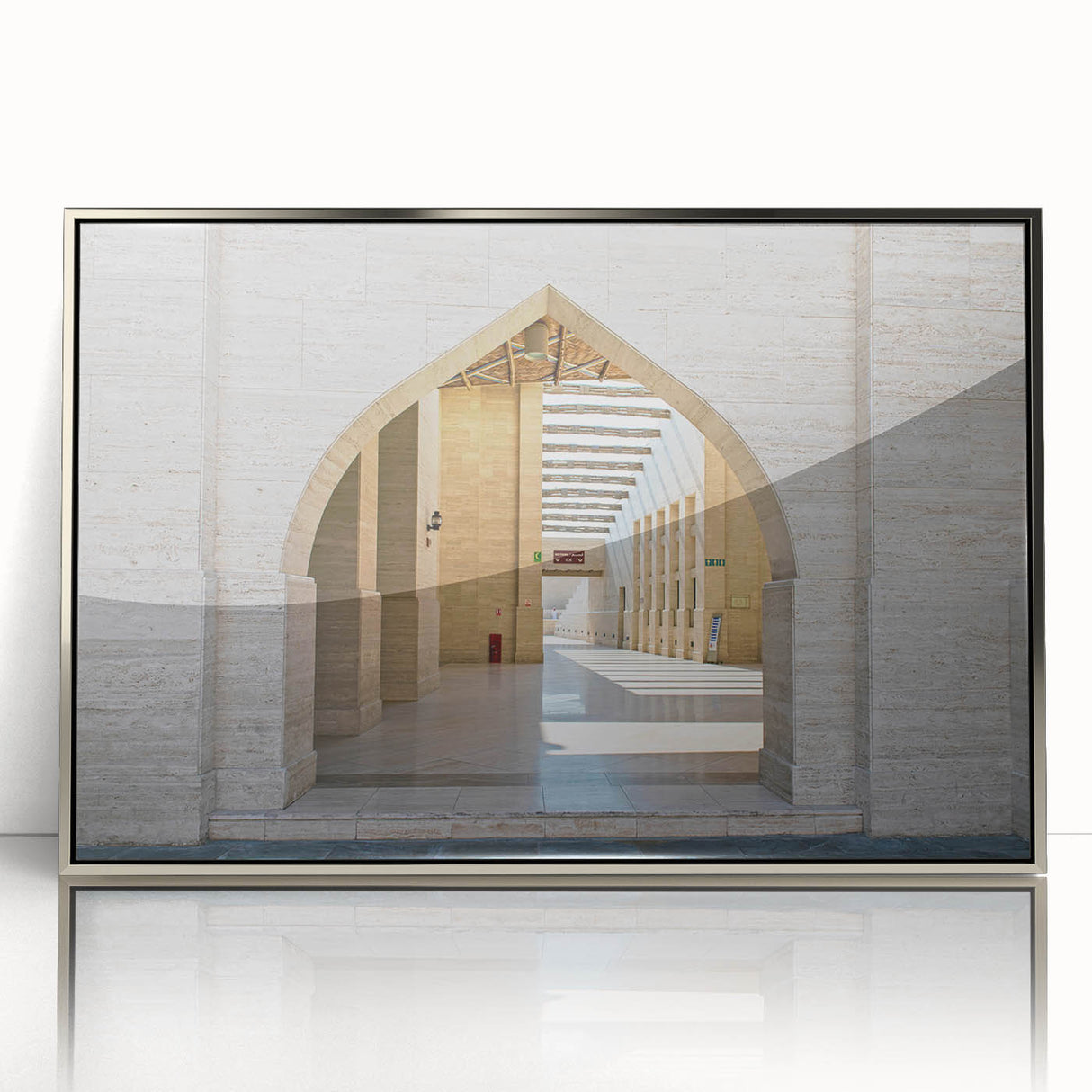 Mid-century modernist art depicting a Qatar scenery in muted earth tones on a silver-framed acrylic print.