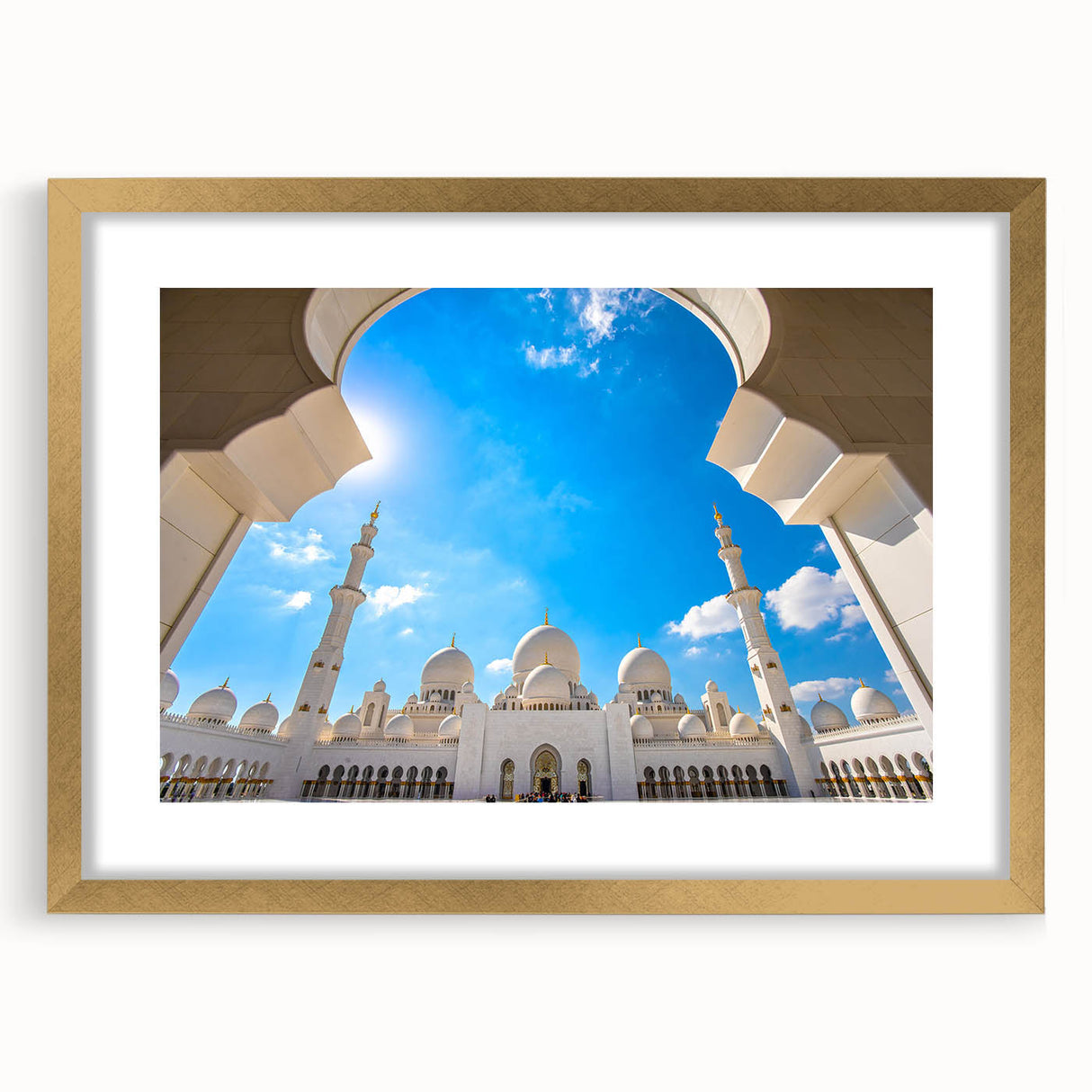 Extra large framed wall art featuring an abstract depiction of Abu Dhabi's skyline in textured gold and black tones.