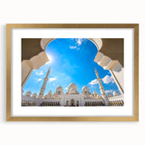 Extra large framed wall art featuring an abstract depiction of Abu Dhabi's skyline in textured gold and black tones.