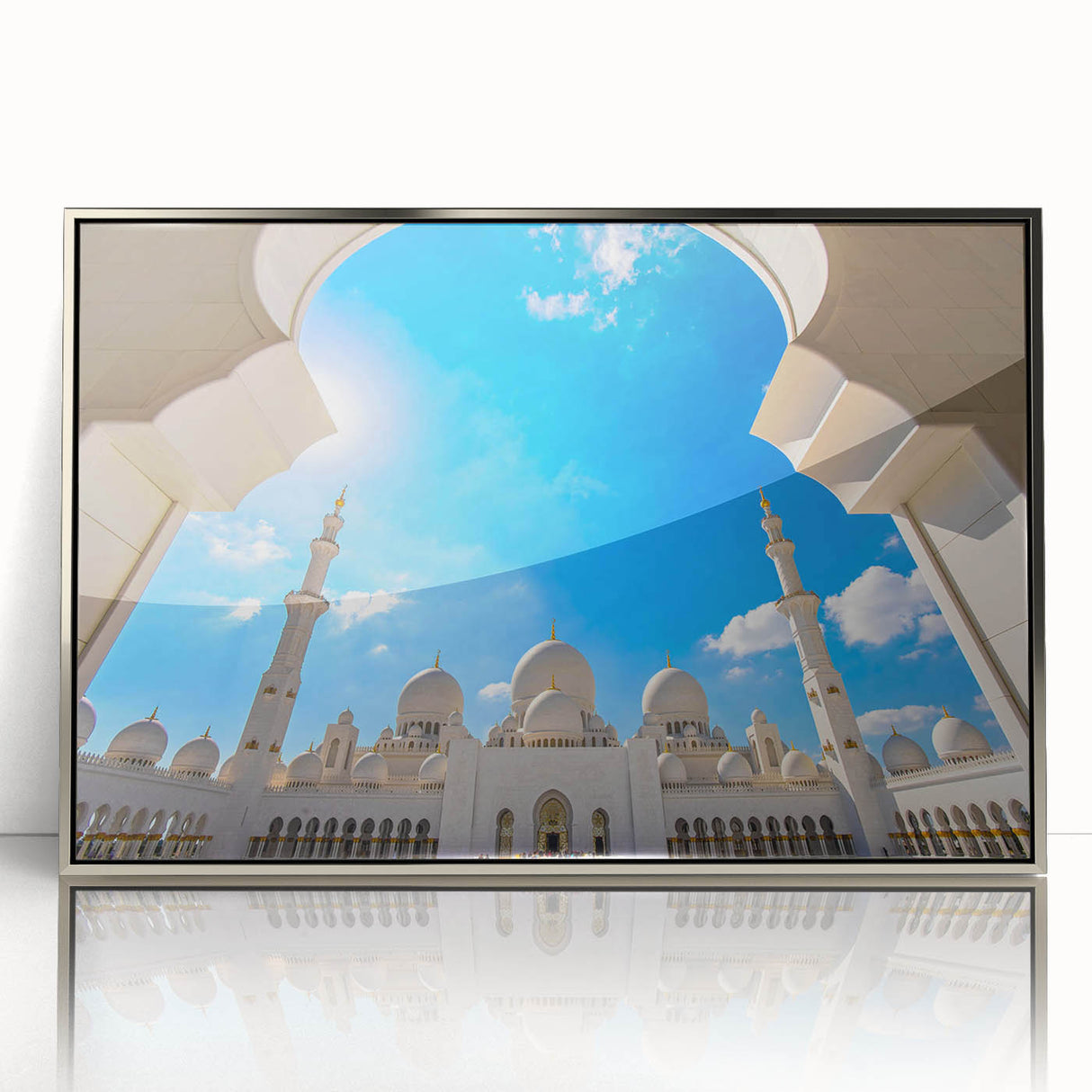 Mid-century modernist art of Abu Dhabi skyline in silver framed acrylic, featuring muted blue and gray tones.