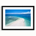 Abstract art print featuring vibrant oceanic blues and greens on a textured canvas, framed in black.