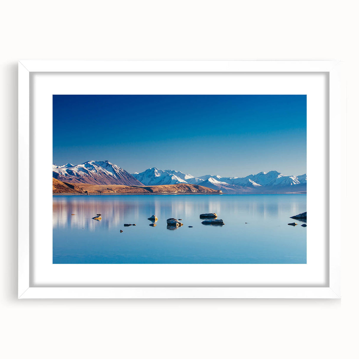 Abstract art print of Canterbury, New Zealand in muted earth tones on a white-framed canvas.