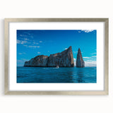 Textured abstract art print of Galapagos scenery in muted earth tones on a silver-framed canvas, ideal for bedroom art.