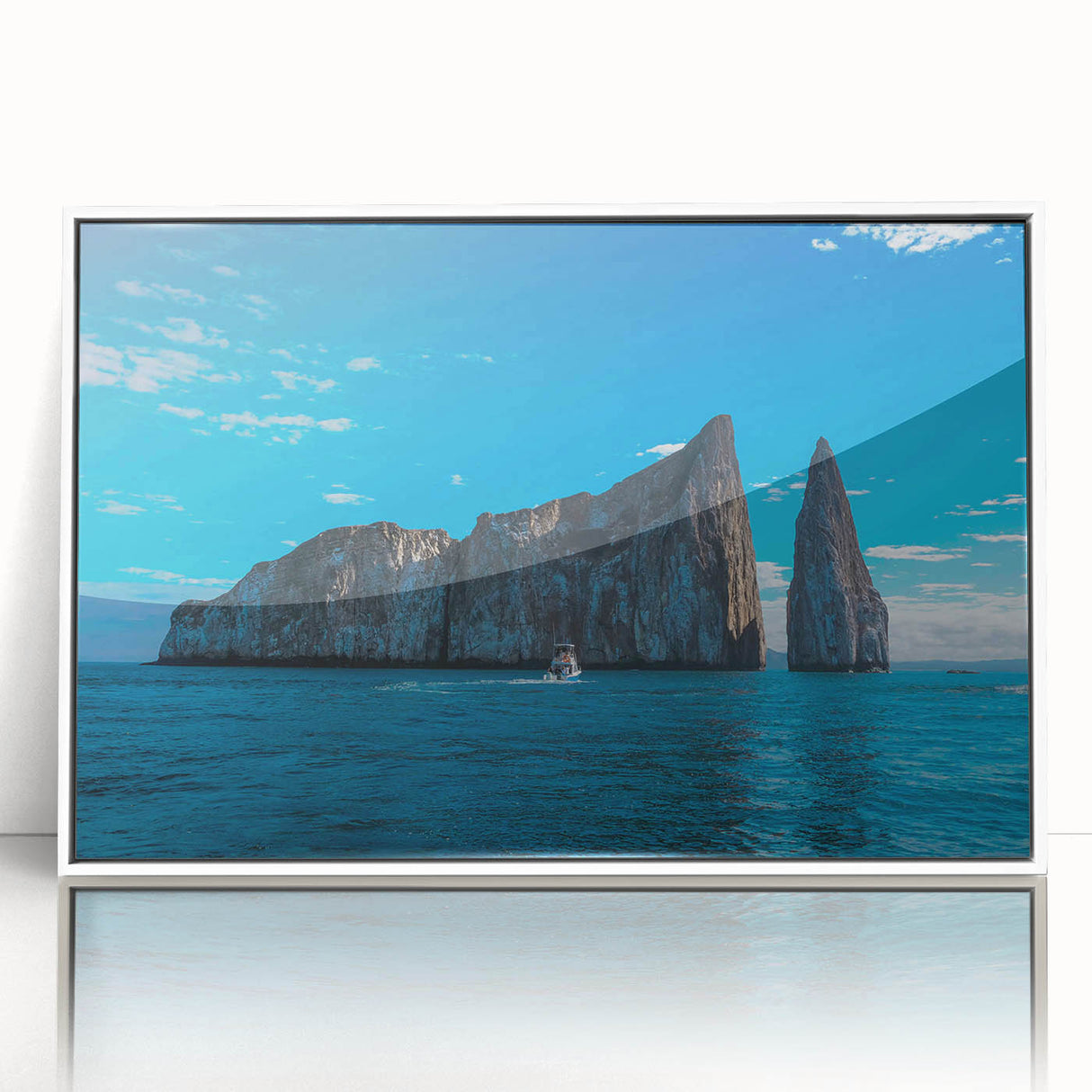 Modern art wall decor featuring a serene Galapagos scenery in soft blue and green tones, acrylic print framed in white.