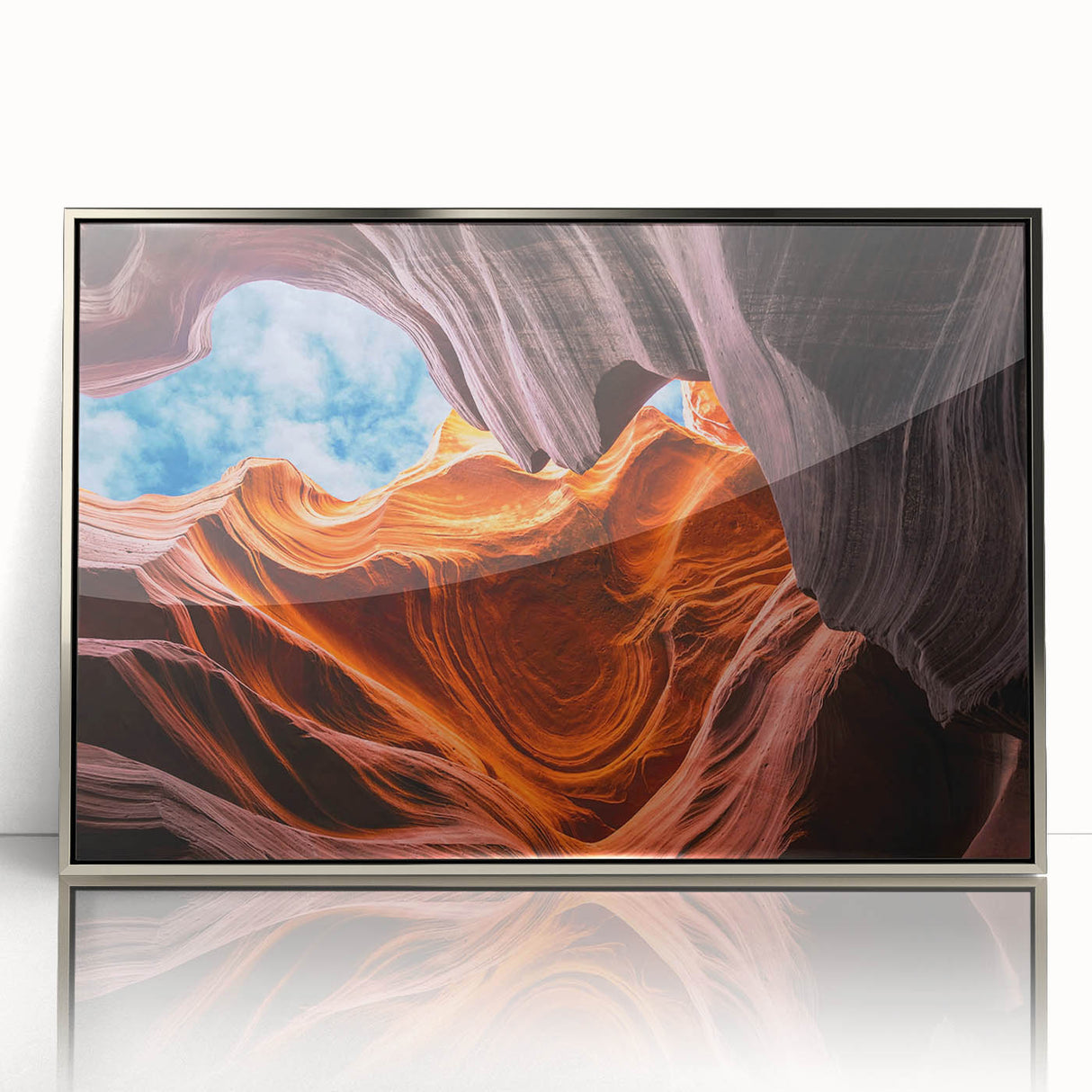 Mid-century modernist art depicting Arizona's Antelope Canyon in muted earth tones on a silver-framed acrylic print.