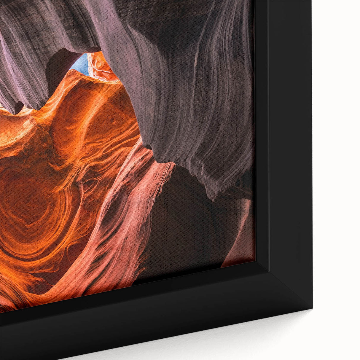 Extra large framed canvas of a textured Arizona Antelope Canyon in black with colorful highlights.