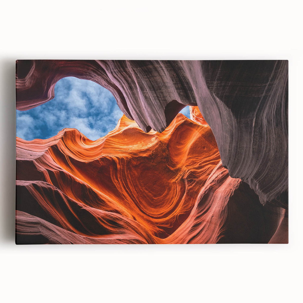 Black and white photograph of Antelope Canyon on stretched canvas, displaying intricate rock formations.