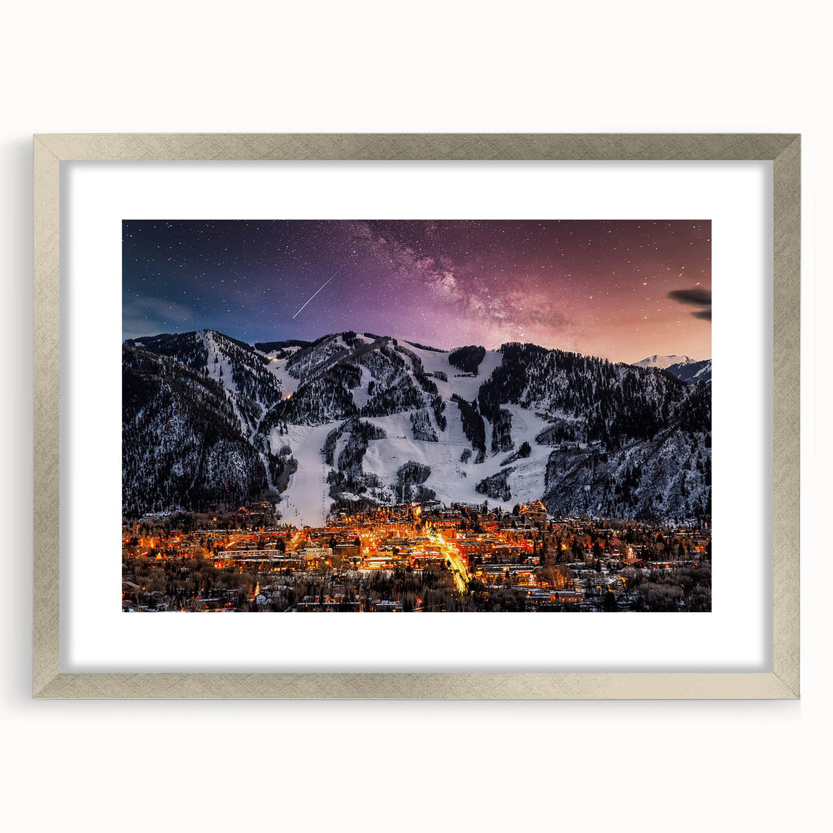 Textured art print depicting abstract shapes in warm earth tones, framed in silver, suitable for bedroom art.