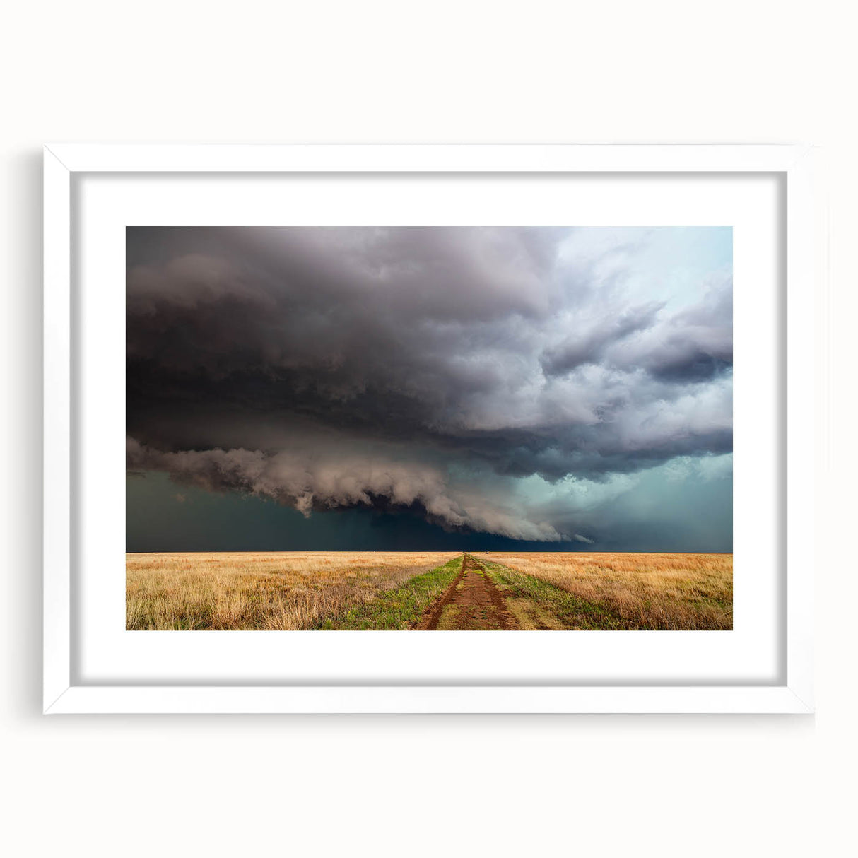 Abstract art print of Kansas scenery in muted earth tones on a framed white mat, suitable for dining room or bedroom decor.