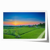 Rolled print of a Kentucky landscape featuring soft pastel colors and floral elements.