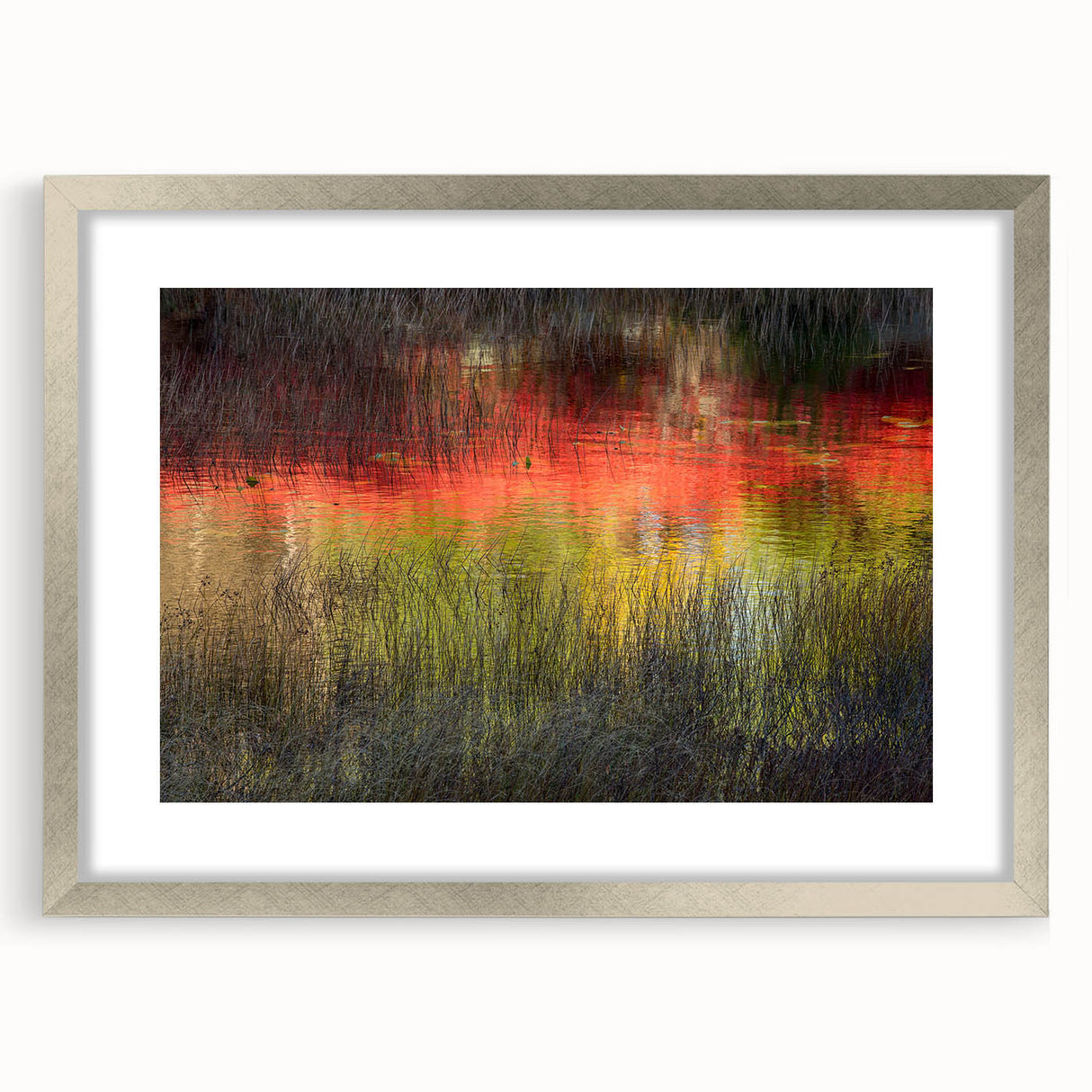 Textured abstract art print depicting Acadia's rugged coastline in muted earth tones, framed in silver.