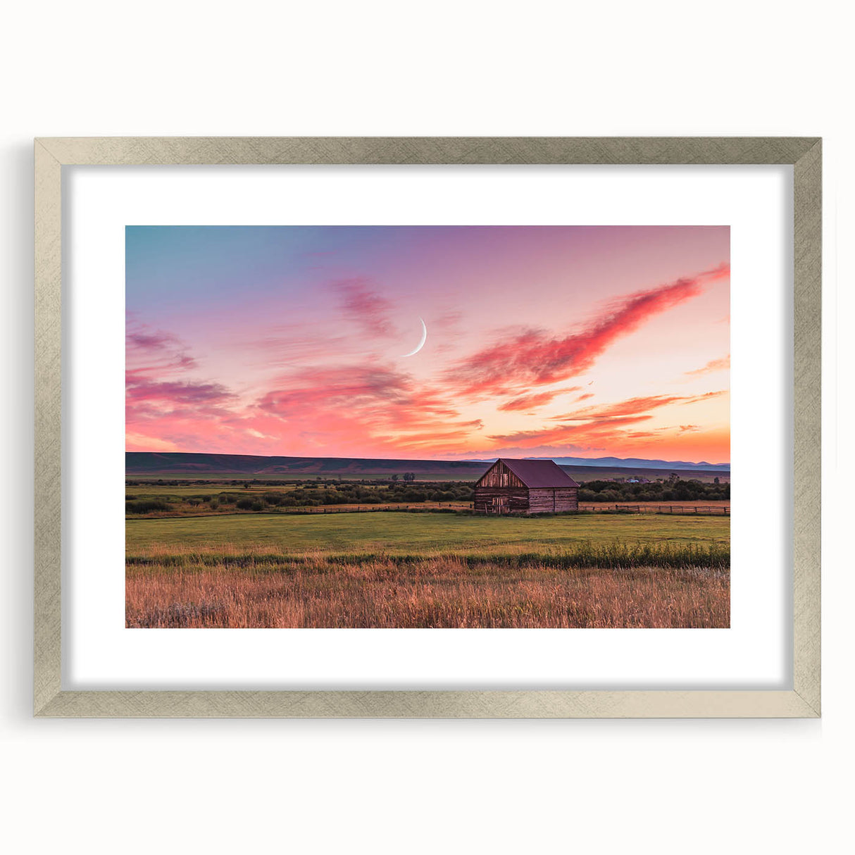 Textured art print of abstract Montana scenery in muted earth tones, framed in silver, ideal for bedroom art.