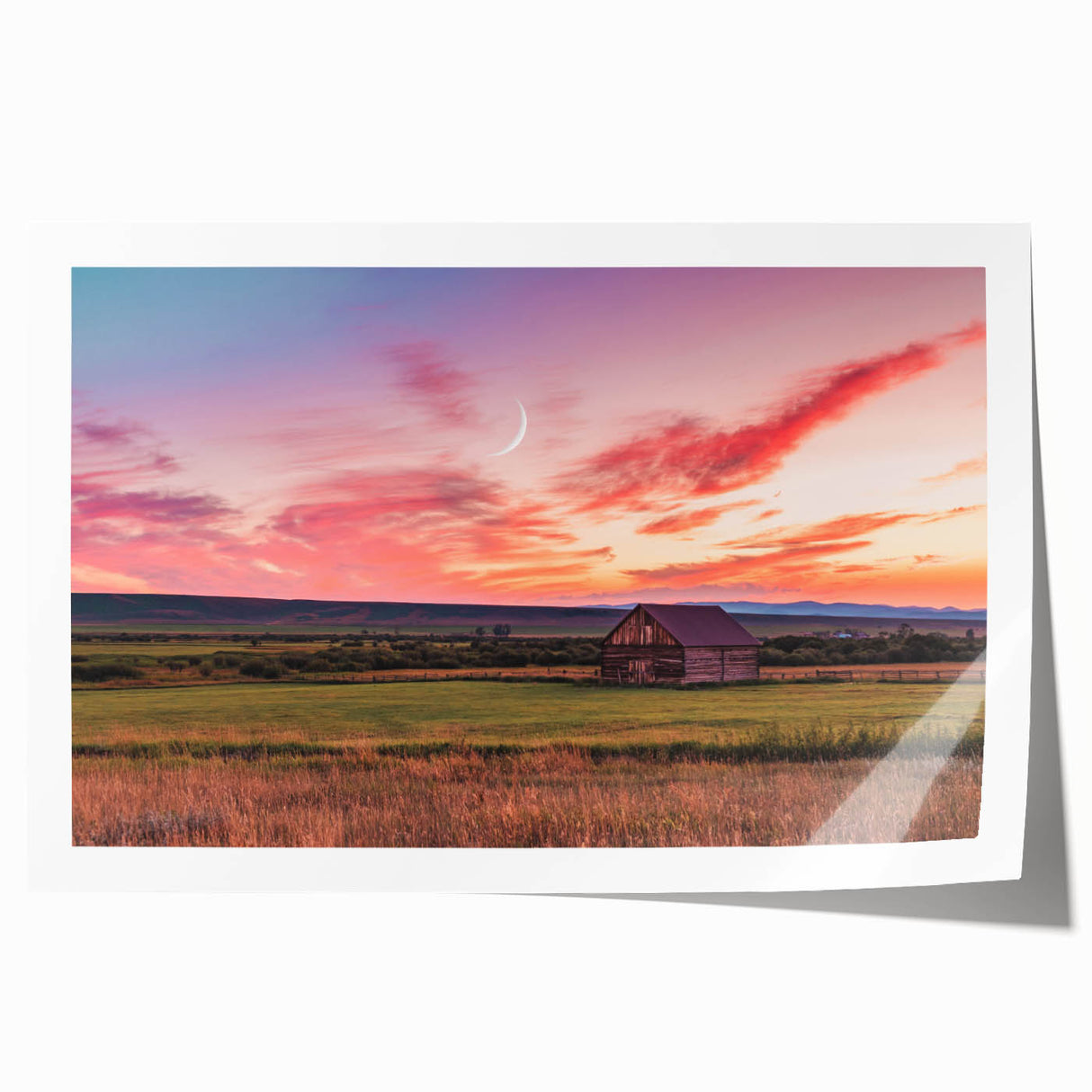 Extra large rolled print depicting a serene Montana landscape with vibrant green meadows under a clear blue sky.