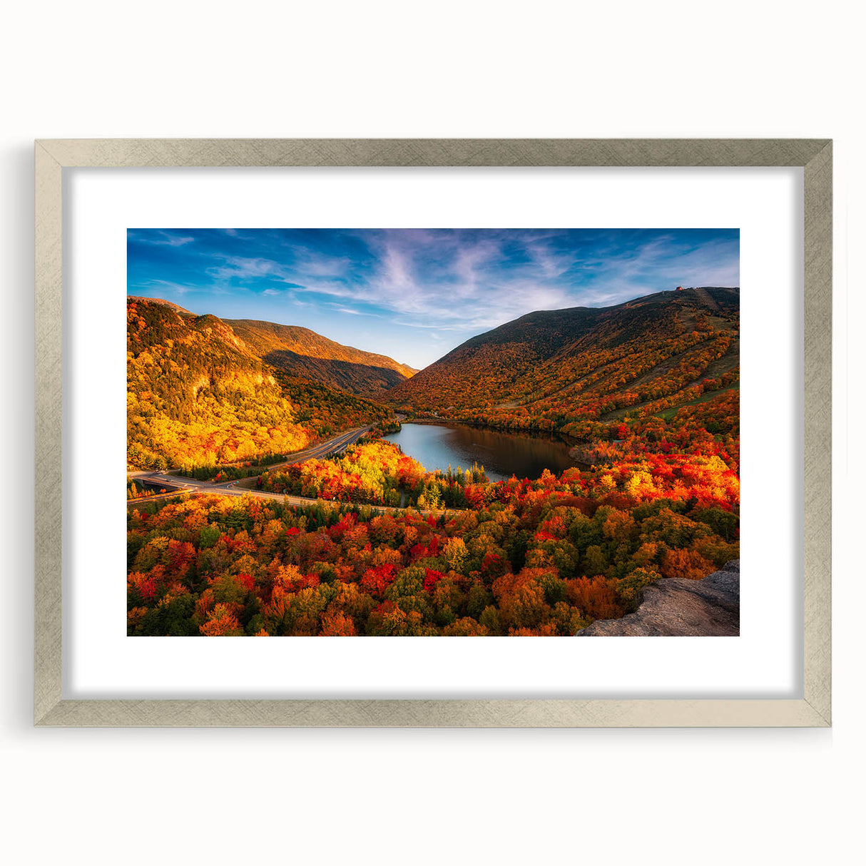 Textured art depicting abstract forest scenery in muted green and brown tones on a framed canvas, suitable for bedroom decor.