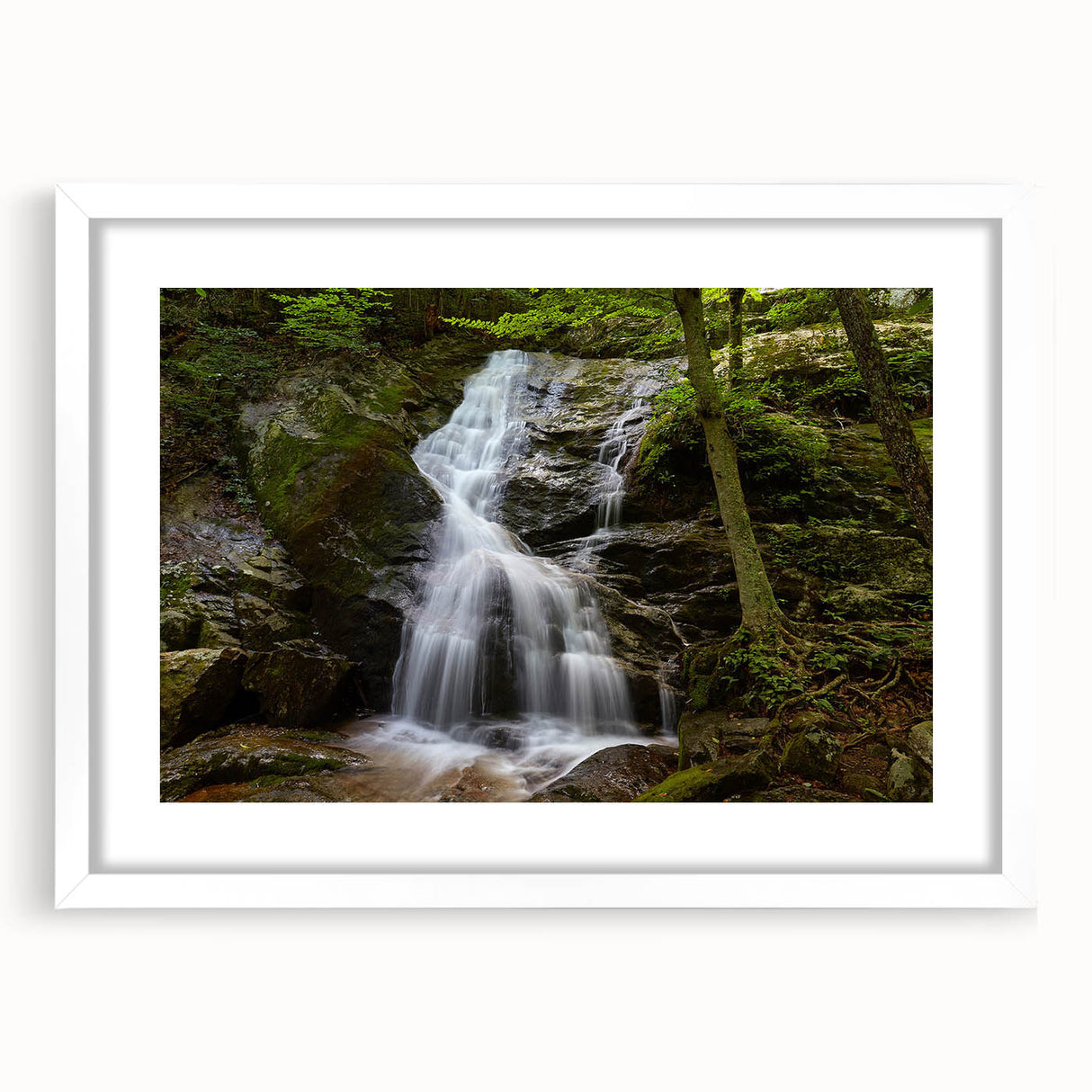 Abstract art print of a Virginia landscape in muted green and blue tones, framed with a white mat.