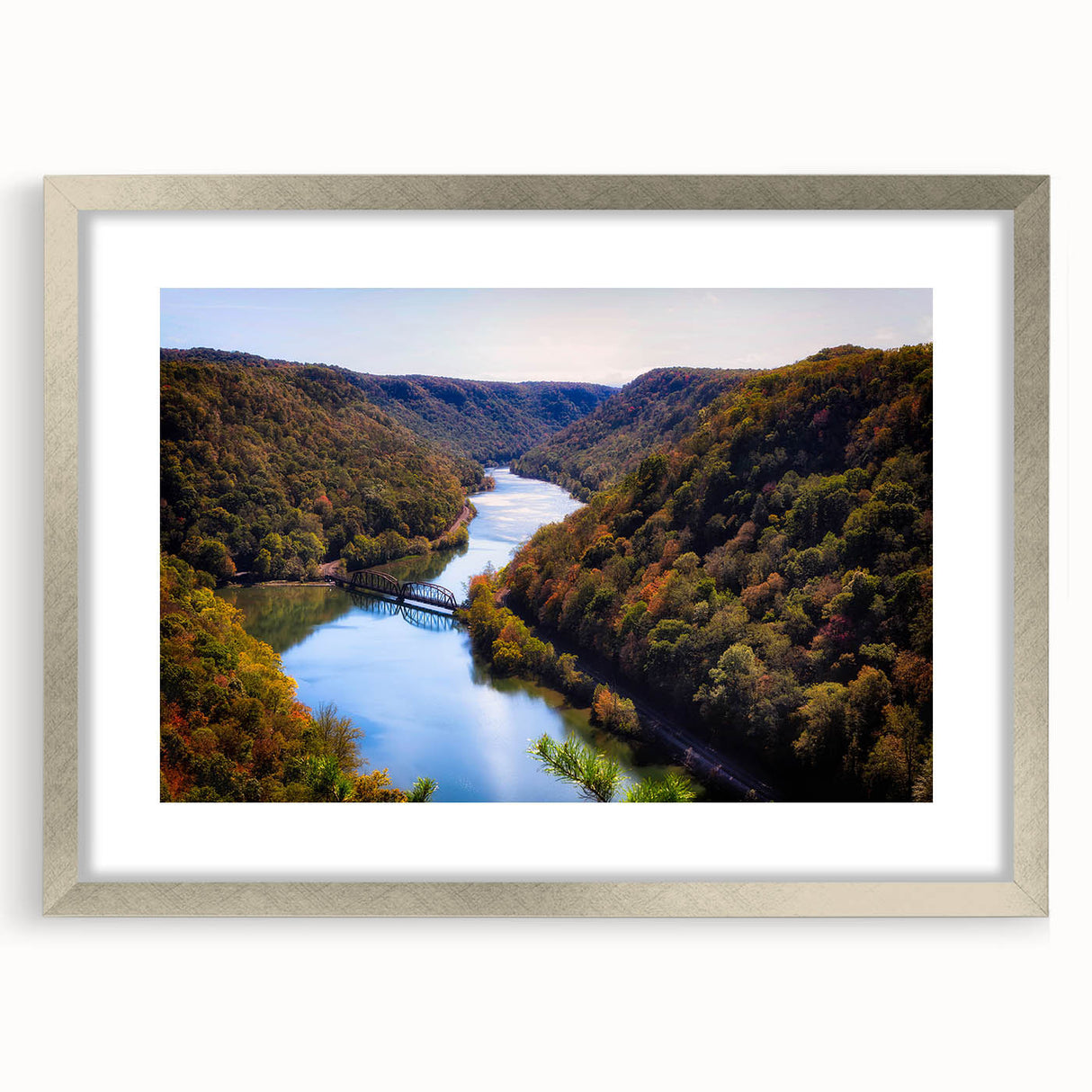 Textured art depicting abstract West Virginia scenery in muted earth tones on a framed silver mat.