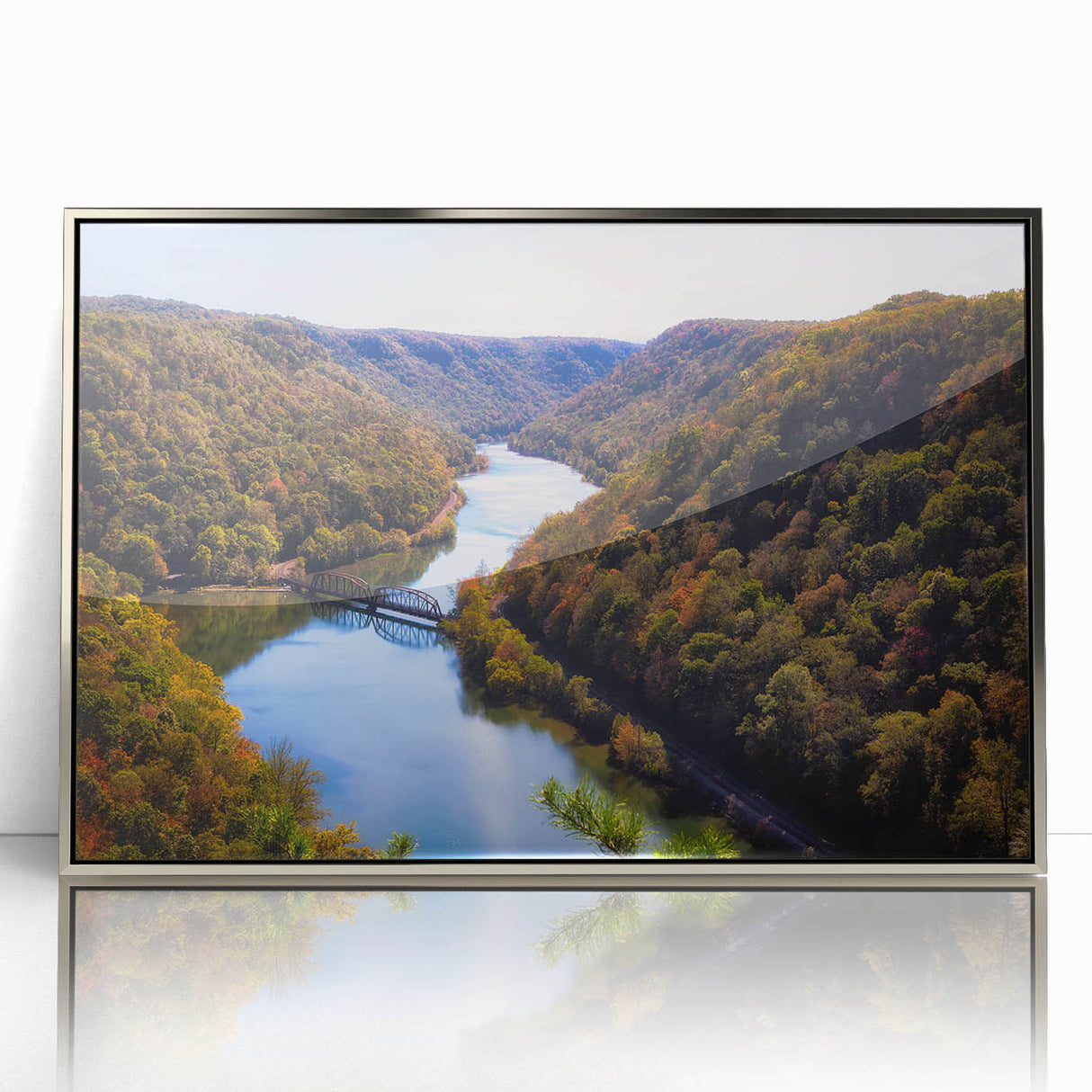 Mid-century modernist art depicting West Virginia scenery in muted earth tones, framed in silver acrylic.