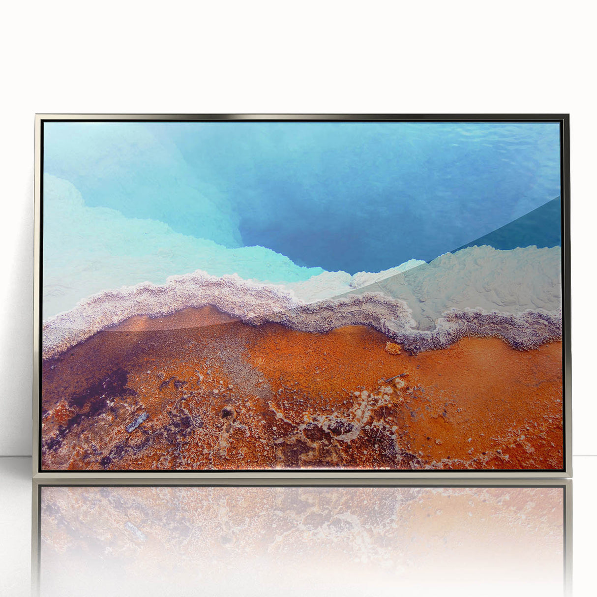 Mid-century modernist art depicting Yellowstone scenery in muted earth tones on a silver-framed acrylic print.