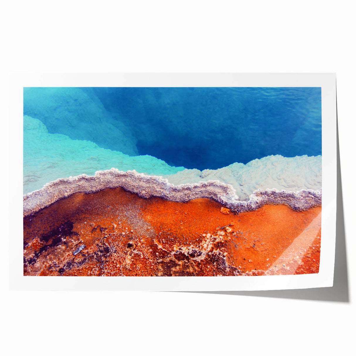 Yellowstone Park scenery on rolled print, featuring vibrant green and blue tones, ideal for dining room wall art.