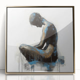 Framed acrylic artwork showcasing an abstract figurative design in gold tones, highlighting smooth textures and elegant lines, perfect for modern home decor.