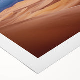 Desert landscape rolled canvas print showcasing golden sand dunes under a clear blue sky, perfect for adding a warm, natural element to home decor.