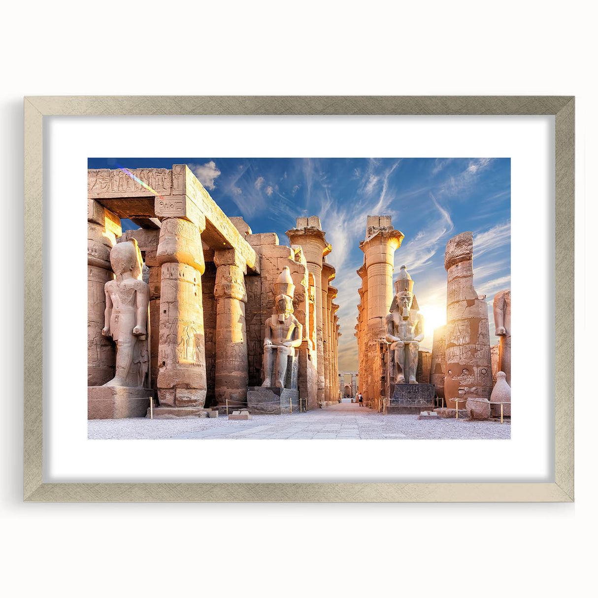 Abstract art print of an Egyptian landscape in muted earth tones on a framed silver mat, suitable for dining room decor.