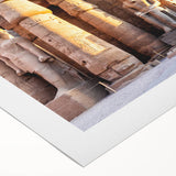 Art deco poster of Egyptian scenery on rolled canvas, featuring muted earth tones, ideal for dining room wall art.