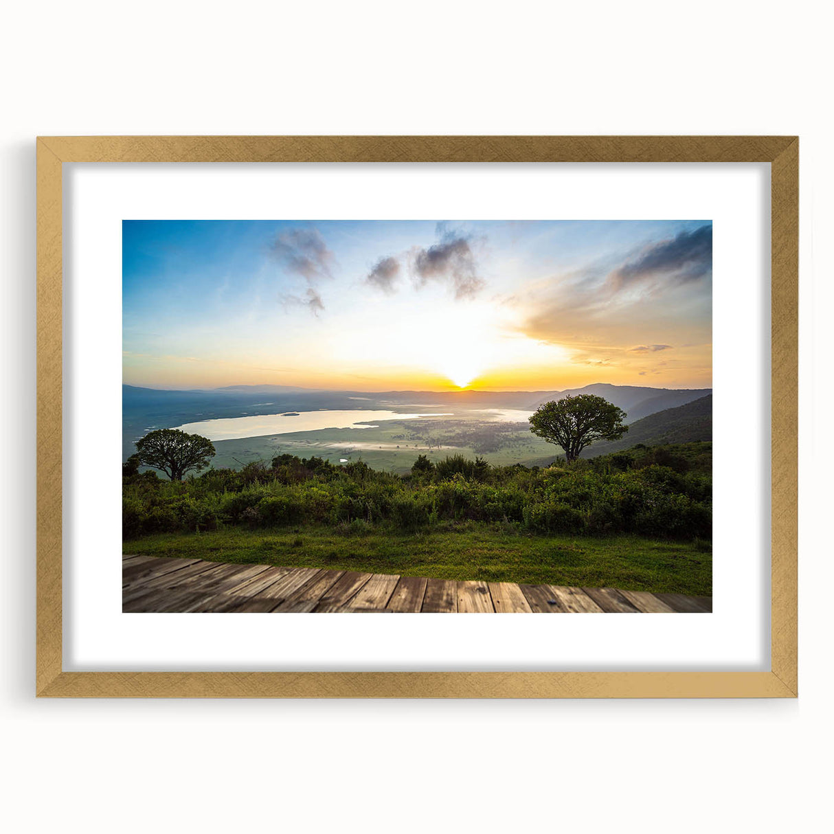 Extra large abstract art print depicting a textured African landscape in earth tones, framed in gold.