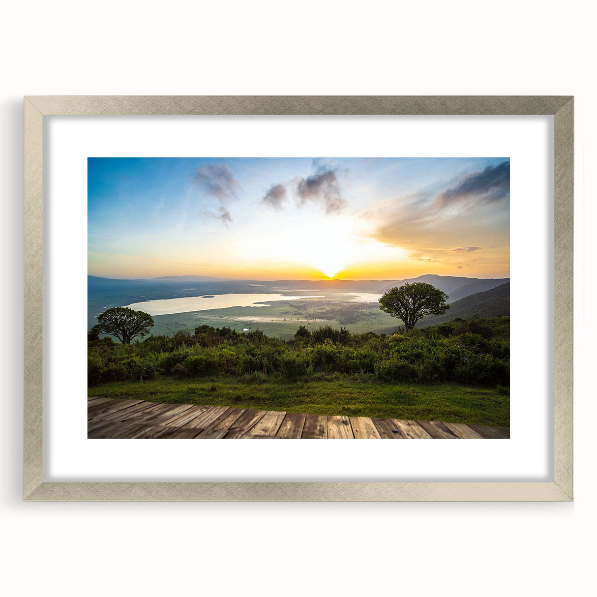 Textured abstract art print featuring a serene Tanzanian landscape in earthy tones, framed with a silver mat.
