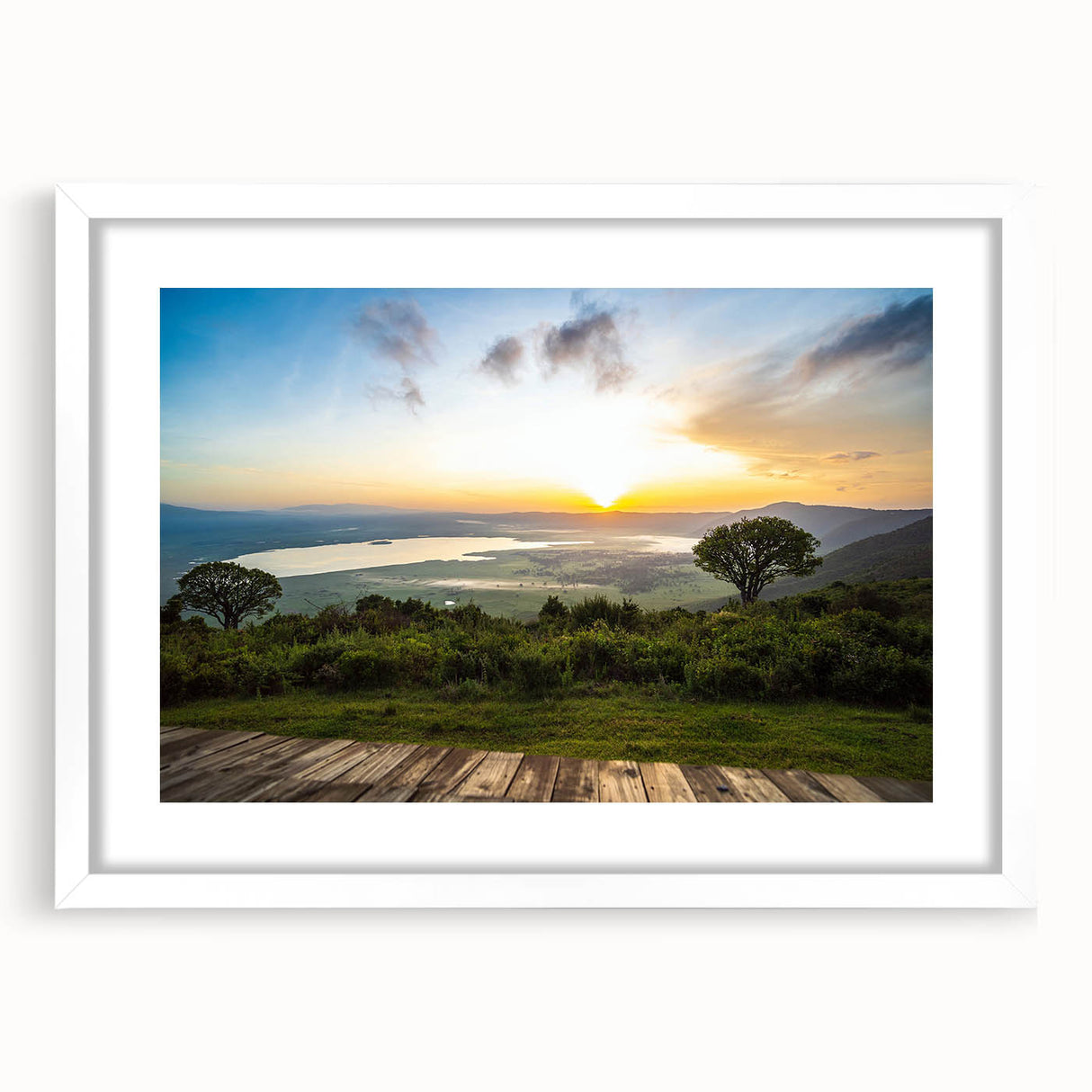 Abstract art print of the Tanzania landscape in muted earth tones on a framed white mat, ideal for dining room decor.