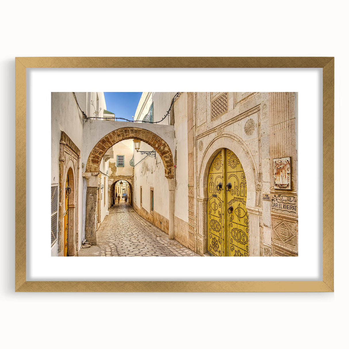 Extra large abstract art print of a textured African scenery in gold frame, ideal for living room decor.