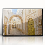 Large abstract wall art depicting a Tunisian landscape in muted earth tones, framed in black acrylic.