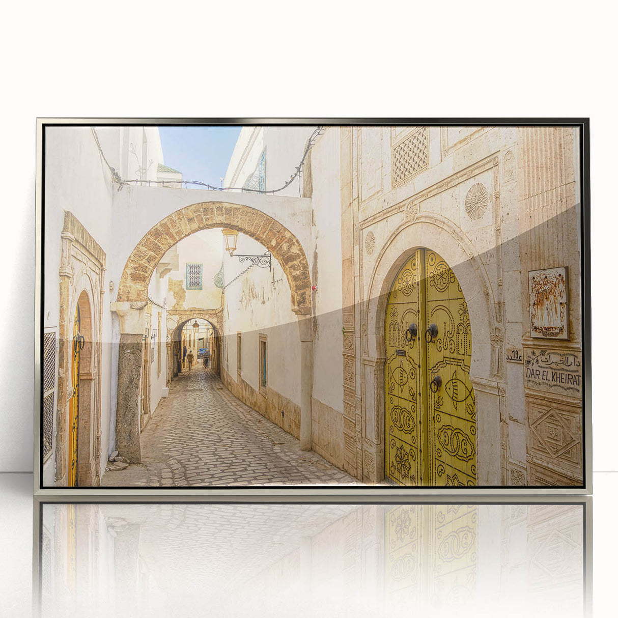 Mid-century modernist art depicting Tunisian scenery in muted earth tones on a framed acrylic.