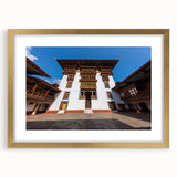 Extra large abstract art print of a Bhutanese landscape in textured gold frame, ideal for living room decor.