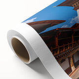 Art deco poster of Bhutan scenery in muted earth tones on rolled canvas, ideal for nursery wall art or dining room decor.