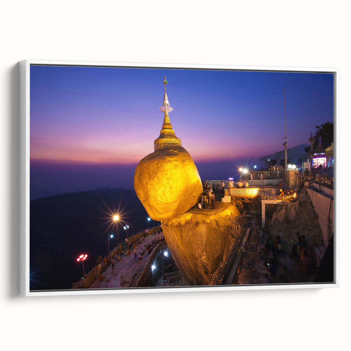 Vintage poster art of a Myanmar scenery on a large framed canvas, featuring colorful artwork against a black background.